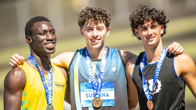 Sebastian Sultana from Campbelltown, centre, who beat Rashid Kabba from Westfield into second place and Lachlan Herbert from Knox Grammar in third in the 200m. Picture: Julian Andrews