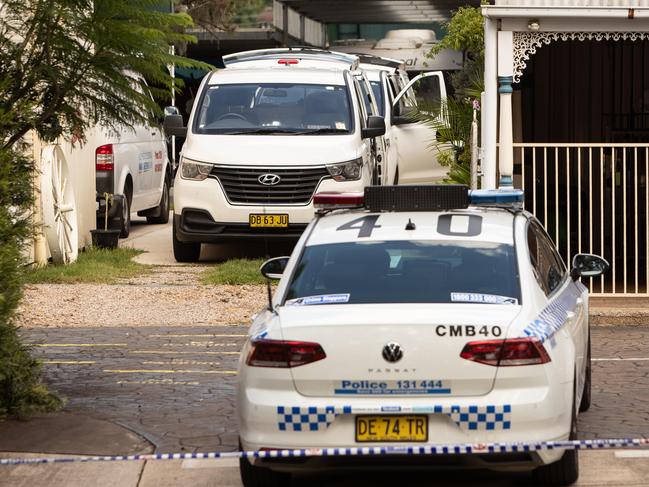 Police at the Greystanes house where the woman was found dead. Picture: Julian Andrews.