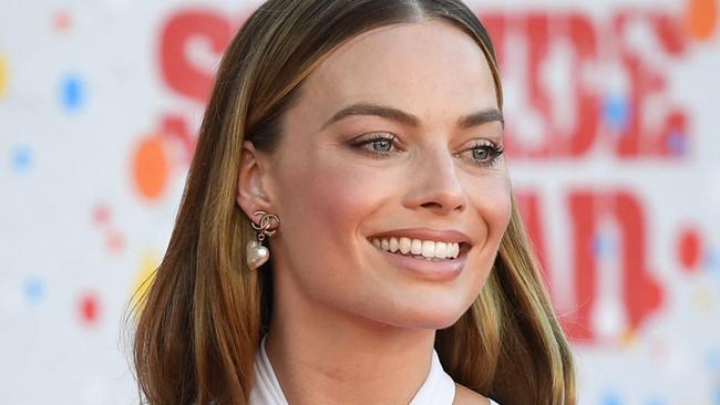 Australian actress Margot Robbie arrives for the premiere of "The Suicide Squad" at the Regency Village theatre in Westwood, California on August 2, 2021. (Photo by Robyn Beck / AFP)