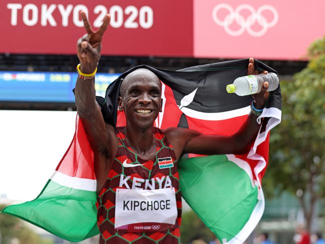 Eliud Kipchoge celebrates after winning the gold medal in the men's marathon. Picture: Getty Images