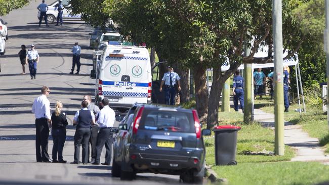 Police at the scene of Davey’s murder.