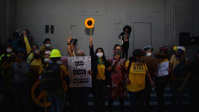 Mothers form a human chain during a protest in front of the Multnomah County Justice Center in Portland, Oregon. Picture: AFP