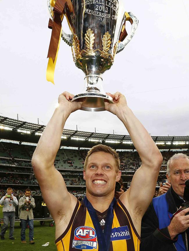 Sam Mitchell holds aloft the 2013 premiership cup. Picture: Michael Klein