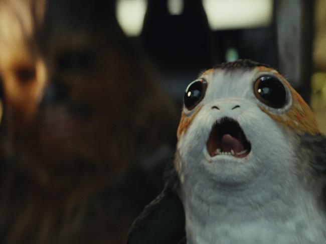 Chewbacca, left, and a Porg in a scene from Star Wars: The Last Jedi. Picture: Lucasfilm via AP