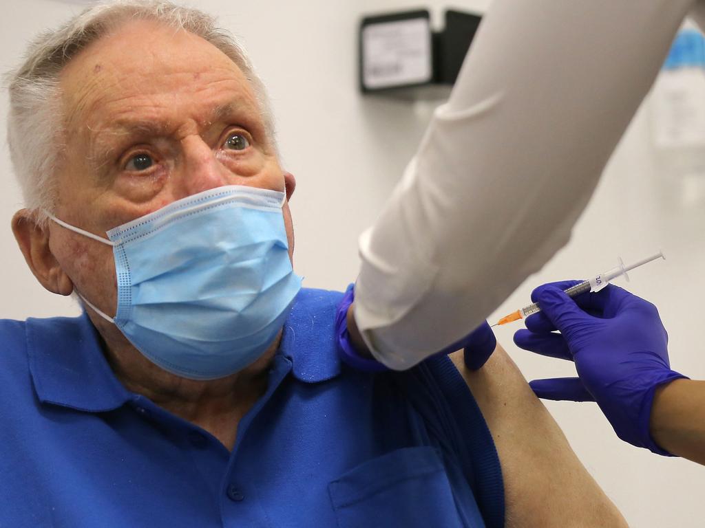 The government says the vaccine will not be mandatory, even in high-risk areas like aged care centre. Picture: Steven Saphore / AFP