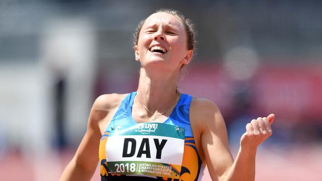 Riley Day celebrates winning the womens 200 metres final during the Australian Athletics Championships at Carrara Stadium. Picture: AAP Image/Darren England.