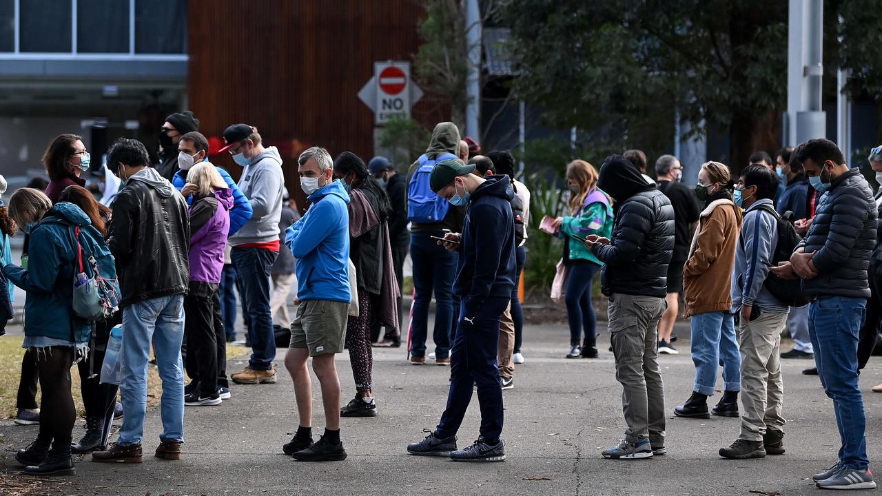 Crowds of people waiting in line for a Covid-19 vaccination at a hub in Sydney. Picture: NCA NewsWire/Bianca De Marchi