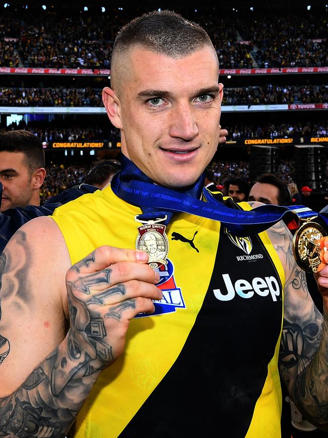 Dustin Martin with his 2017 Norm Smith medal, which Jonathan Simon backed in a disputed multibet.