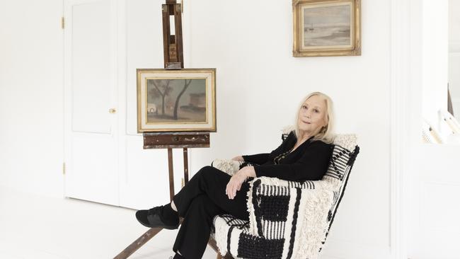 Art curator and historian Ros Hollinrake in Castlemaine, with a Clarice Beckett painting. Picture: Bri Hammond