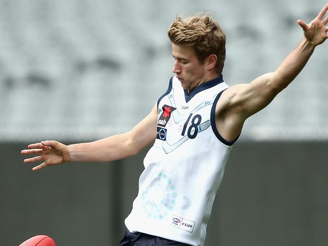 MELBOURNE, AUSTRALIA - JUNE 24:  Mitch Riordan of Vic Country kicks during the U18 match between Vic Country and Vic Metro at Melbourne Cricket Ground on June 24, 2018 in Melbourne, Australia.  (Photo by Robert Prezioso/AFL Media/Getty Images)