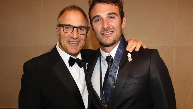 Jobe Watson with his father Tim after winning the 2012 Brownlow Medal.