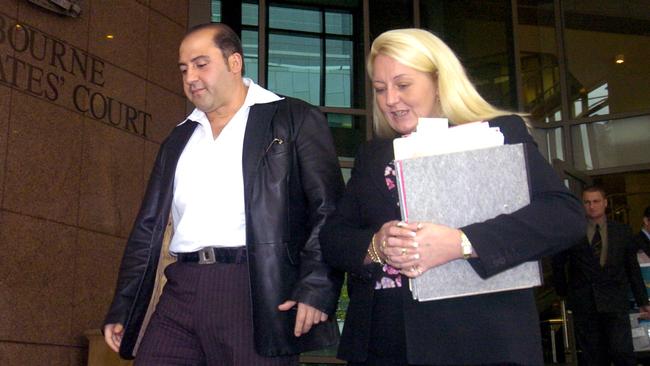 Tony Mokbel leaves Melbourne Magistrates Court with his lawyer, Nicola Gobbo.