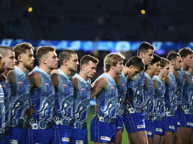 MELBOURNE, AUSTRALIA - MAY 21: Kangaroos line up ahead of the round 10 AFL match between the North Melbourne Kangaroos and the Melbourne Demons at Marvel Stadium on May 21, 2022 in Melbourne, Australia. (Photo by Mike Owen/AFL Photos/via Getty Images)