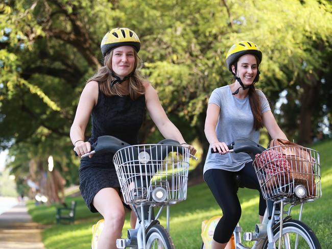 Emma Donaldson and Kathryn Al-Dhafeeri use bike paths in Brisbane’s CBD. Dr Pojani says more emphasis should be given to cycle-friendly infrastructure. Picture: AAP/Claudia Baxter