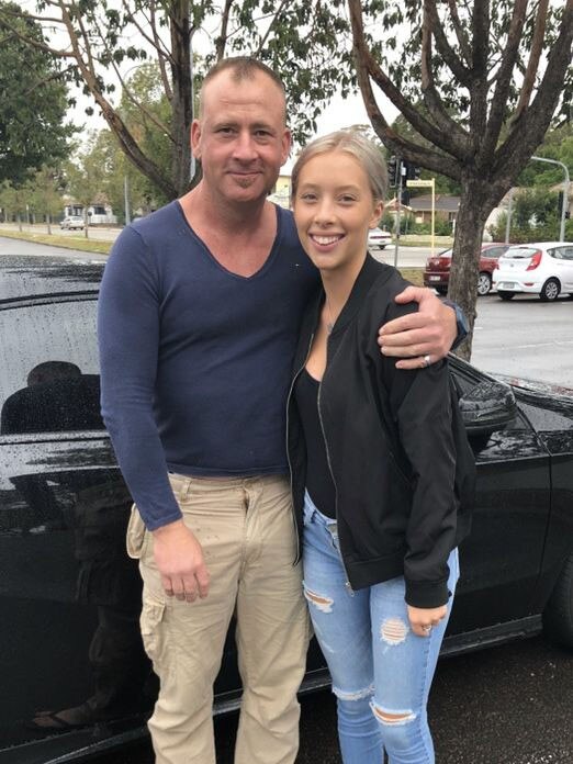 Campbelltown father Jamie Phillips with his daughter.