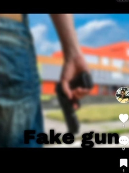 The TikTok showed a person with a firearm standing outside a school building with the words "fake gun".