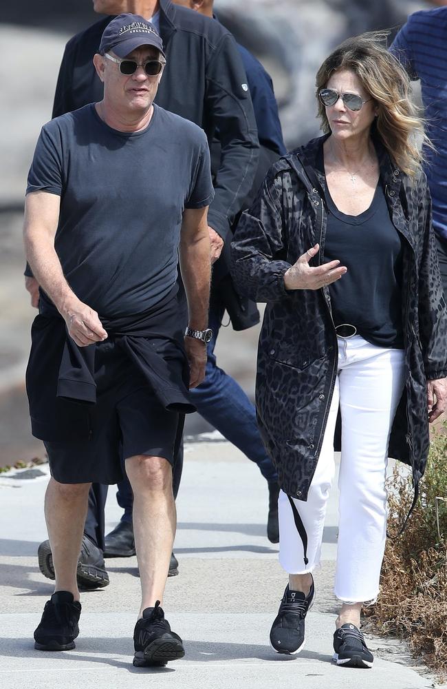 Tom Hanks his wife Rita Wilson doing the coastal walk in Sydney recently. Picture: KHAPGG/BACKGRID