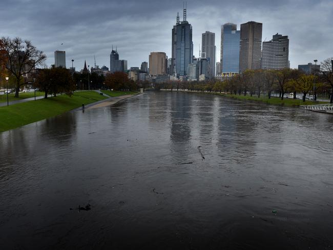 A swollen Yarra River in 2013 after torrential rain in Melbourne. Picture: HWT Library.