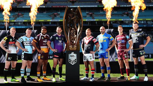 Captains call: The NRL finalists lined up at ANZ Stadium yesterday. Picture: Brett Costello