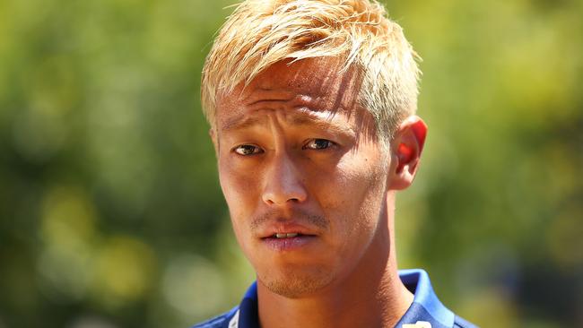 Keisuke Honda of the Melbourne Victory poses during a Melbourne Victory A-League media opportunity on the Yarra River.