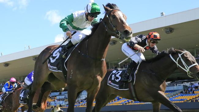 Tim Clark on Entente wins the Ranvet Handicap.