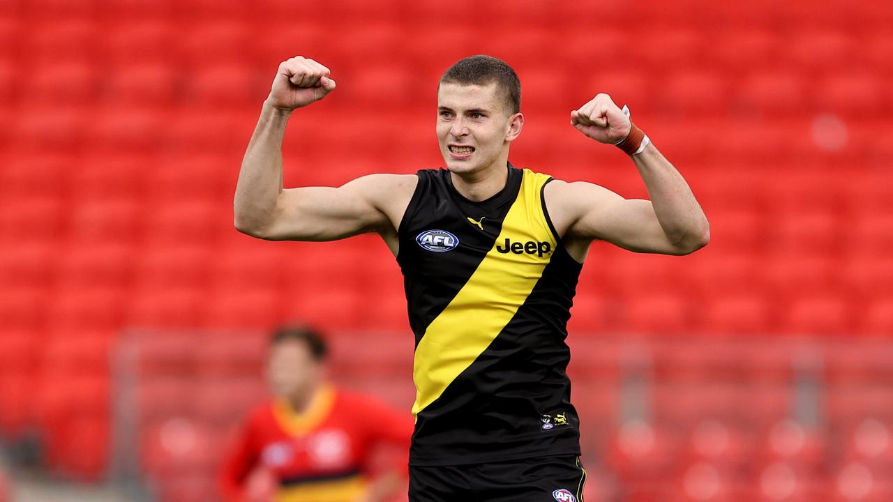 SYDNEY, AUSTRALIA – MAY 30: Callum Coleman-Jones of the Tigers celebrates kicking a goal the round 11 AFL match between the Richmond Tigers and the Adelaide Crows at GIANTS Stadium on May 30, 2021 in Sydney, Australia. (Photo by Brendon Thorne/Getty Images)