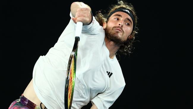 MELBOURNE, AUSTRALIA - JANUARY 24: Stefanos Tsitsipas of Greece serves in the quarterfinals singles match against Jiri Lehecka of Czech Republic during day nine of the 2023 Australian Open at Melbourne Park on January 24, 2023 in Melbourne, Australia. (Photo by Graham Denholm/Getty Images)