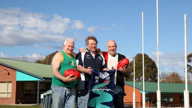 Orbost-Snowy Rovers president Royston Nettleton, centre, with former players Denis Morgan and Brett Lynn. Picture: Yuri Kouzmin