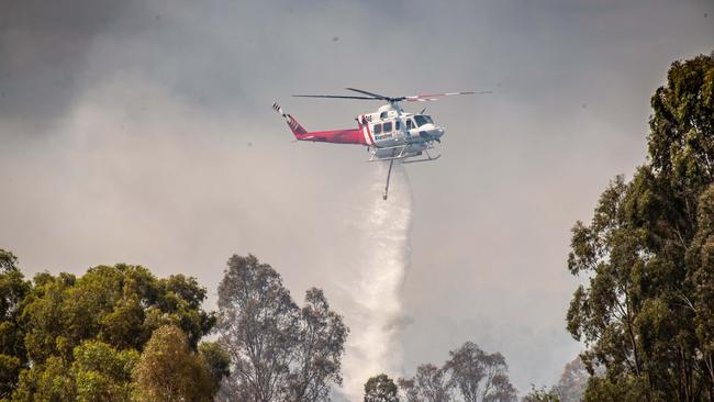 The fire broke out beside the Hume Highway. Picture: Jason Edwards