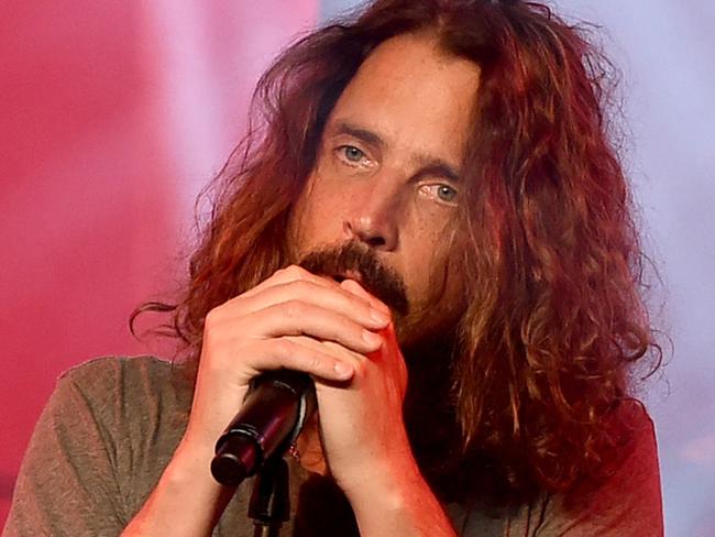 (FILES) This file photo taken on January 20, 2017 shows singer Chris Cornell performing at Prophets of Rage and Friends' Anti Inaugural Ball at the Taragram Ballroom in Los Angeles, California.   Singer Chris Cornell, the grunge rock pioneer and lead singer of the group Soundgarden, has died after performing with the group in Detroit, US news reports said on May 18, 2017. He was 52-years-old. / AFP PHOTO / GETTY IMAGES NORTH AMERICA / KEVIN WINTER