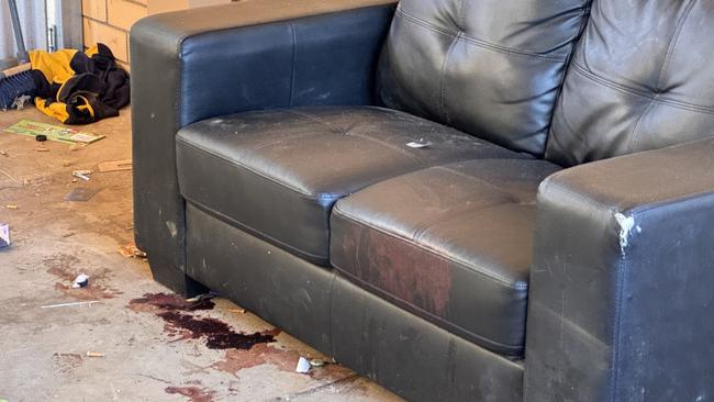 Blood on a couch at a unit in Bronte Crescent, Elizabeth East, where a woman was fatally stabbed. Picture: Roy VanDerVegt