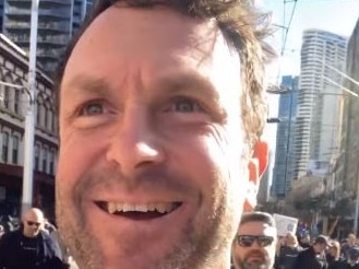 Brady Gunn, founder of Sydney 'freedom' group A Stand in the Park, the Sydney CBD rally in July.