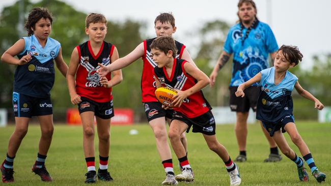 Under-10s compete in the first Darwin Buffaloes NTFL home game against Southern Districts at Woodroffe Oval. Picture: Pema Tamang Pakhrin