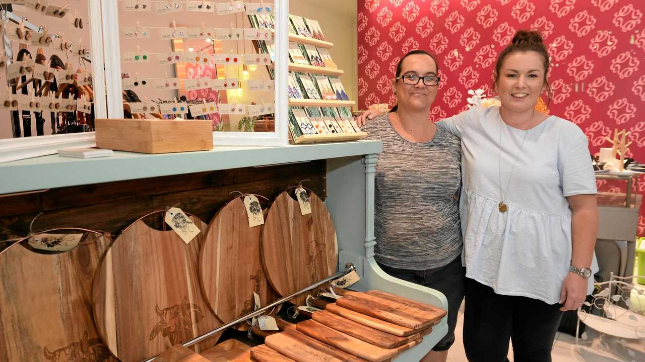 ALL ABOARD: Korina Fraser and Holly Sherwood setting up new shop,  Made in CQ. Picture: Allan Reinikka ROK090918amadeinc