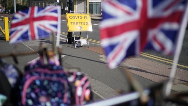 A sign outside Bolton Market in England directs people to the COVID-19 testing centre. Picture: Christopher Furlong/Getty Images