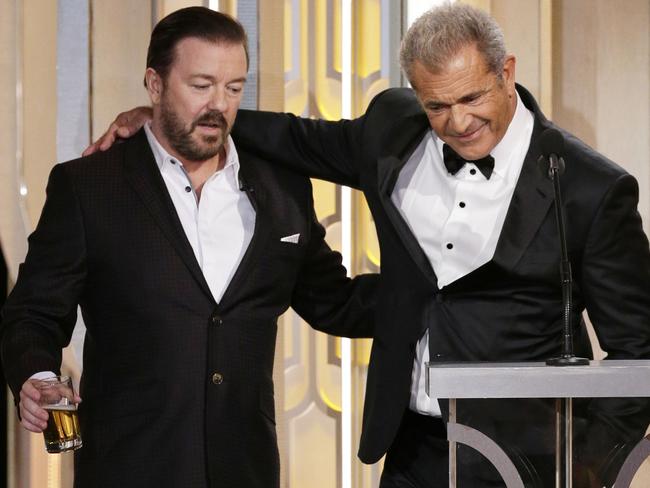 Awkward exchange ... Ricky Gervais and Mel Gibson. Picture: Paul Drinkwater/NBCUniversal via Getty Images