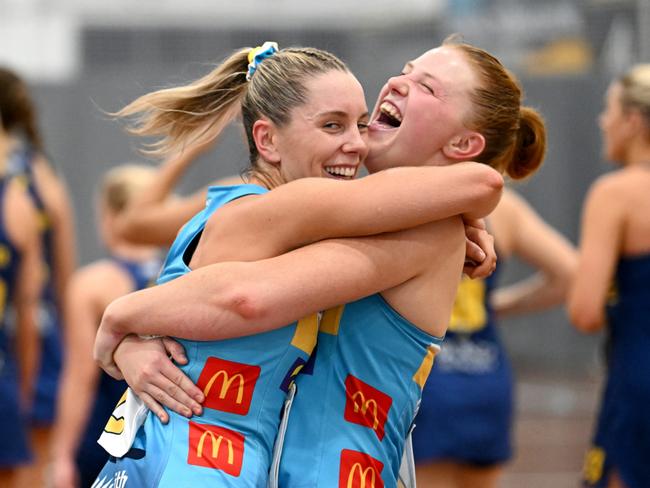 Titans players Kourtnee Baird and Emily Gilbert celebrate their first win of the 2023 Sapphire Series. Image: Scott & Chloe Davis.