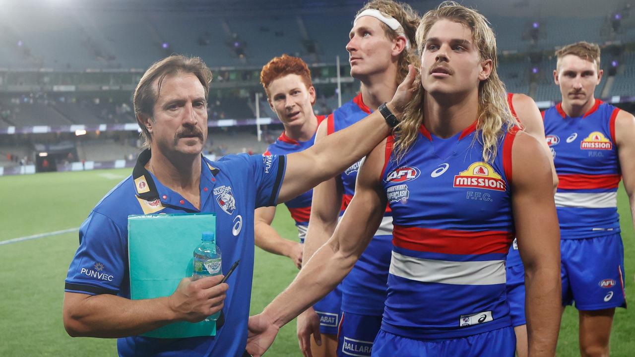 Western Bulldogs coach Luke Beveridge (left) says Smith was held back from returning from an ACL injury this season to ensure he was able to ‘have a bright future in the game’. Picture: Michael Willson / Getty Images