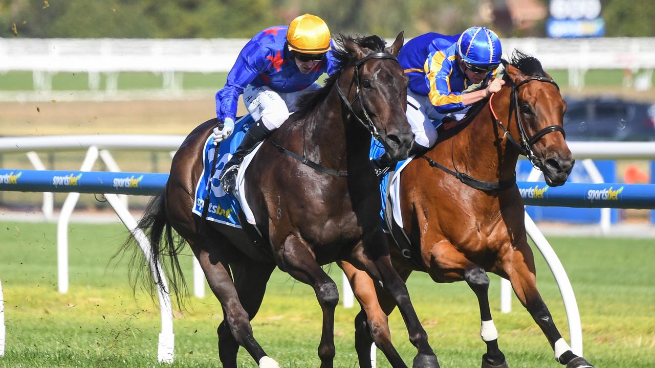 Queman (left) wins the Oakleigh Plate at Caulfield. Picture: Pat Scala-Racing Photos