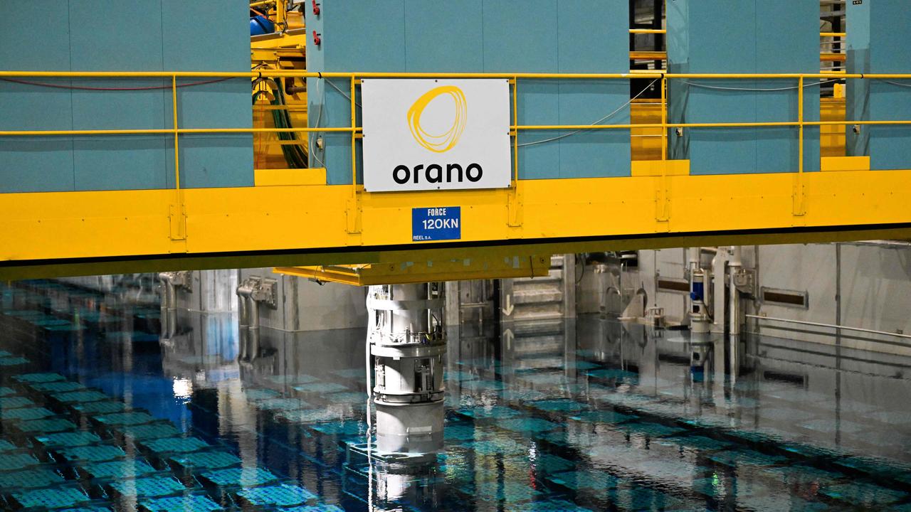 The nuclear waste storage pool of Orano la Hague, a nuclear fuel reprocessing plant, in La Hague, northwestern France (Photo by DAMIEN MEYER / AFP)