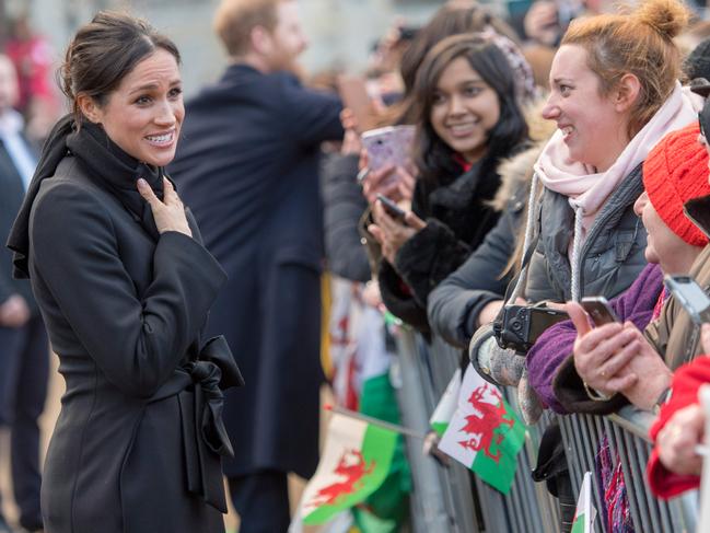 Prince Harry and fiance Meghan Markle during a walkabout at Cardiff Castle on January 18, 2018 in Cardiff, Wales. Picture: Getty