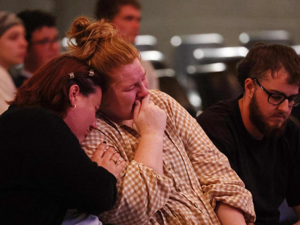Mourners at a memorial on Tuesday night. Picture: Liam Kidston