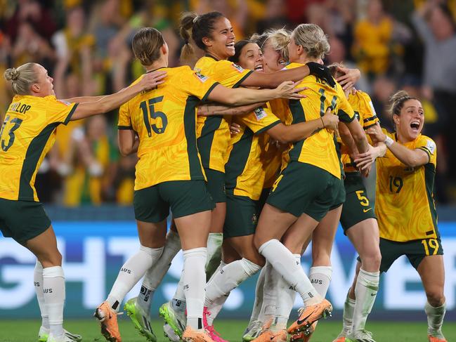 Australia players celebrate their victory through the penalty shoot out against France. Picture: Chris Hyde – FIFA/FIFA via Getty Images