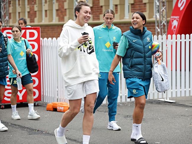 Arnold and Sam Kerr leaving the Sydney Swans HQ training centre in More Park. Picture: Adam Yip