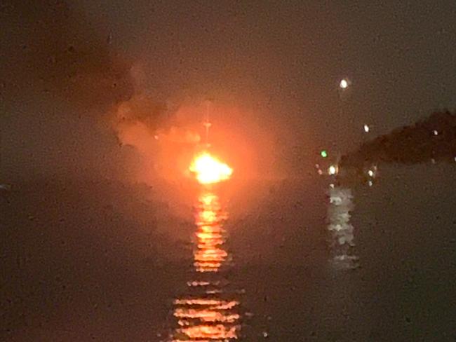 The boat burns off the coast of Airlie Beach. Photo: Stephen Margetts.