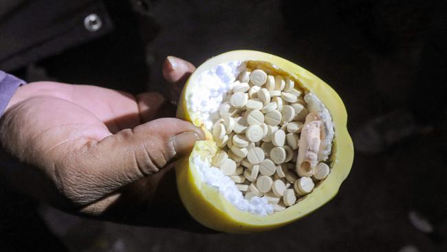 Captagon pills hidden in fake fruit. Picture: AFP