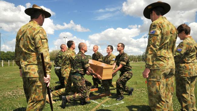 Rehearsals for the reinterment of remains found at Pheasant Wood near the village of Fromelles. Picture: Jayne Russell