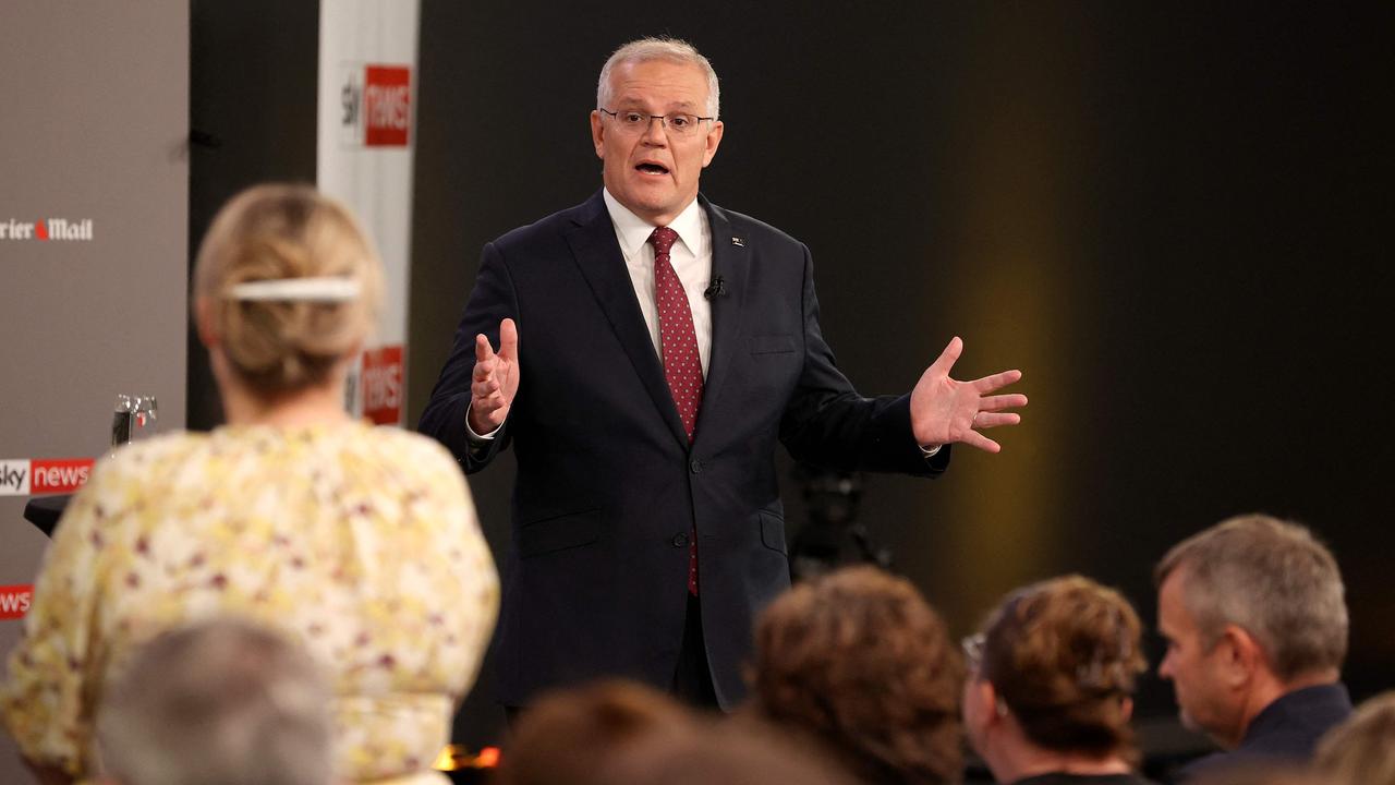 Australian Prime Minister Scott Morrison attends the first leaders' debate of the 2022 federal election campaign at the Gabba in Brisbane on April 20, 2022. (Photo by Jason Edwards / various sources / AFP)