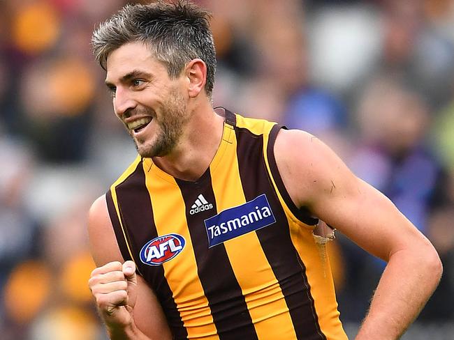 MELBOURNE, AUSTRALIA - MARCH 31: Ricky Henderson of the Hawks celebrates kicking a goal during the round two AFL match between the Hawthorn hawks and the Western Bulldogs at Melbourne Cricket Ground on March 31, 2019 in Melbourne, Australia. (Photo by Quinn Rooney/Getty Images)