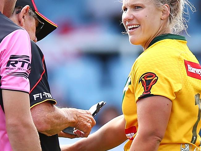 SYDNEY, AUSTRALIA - NOVEMBER 22:  Renae Kunst of Australia makes an official bitiing complaint during the Women's Rugby League World Cup match between the Canadian Ravens  and the Australian Jillaroos at Southern Cross Group Stadium on November 22, 2017 in Sydney, Australia.  (Photo by Mark Nolan/Getty Images)